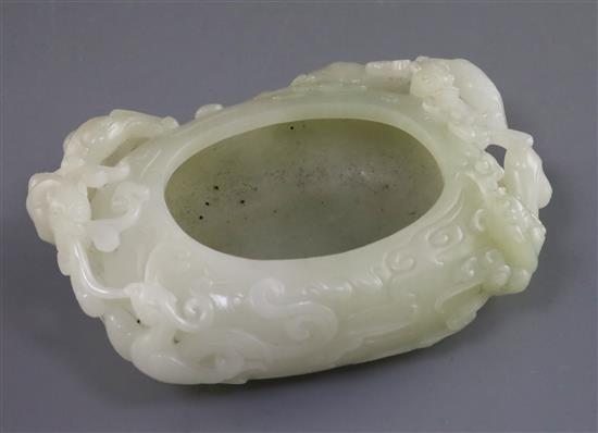 A Chinese pale celadon jade brush washer, L. 15.8cm
